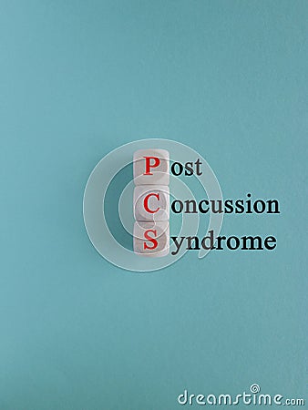 PCS post-concussion syndrome symbol. Concept red words PCS post-concussion syndrome on wooden cubes Stock Photo