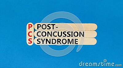 PCS post-concussion syndrome symbol. Concept words PCS post-concussion syndrome on wooden stick on a beautiful blue table blue Stock Photo