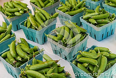 Pea pods in baskets Stock Photo