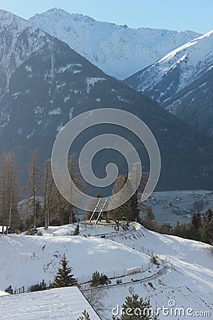 The peace bell in MÃ¶sern, Tirol, Austria infront of the Inn valley with mountains Stock Photo