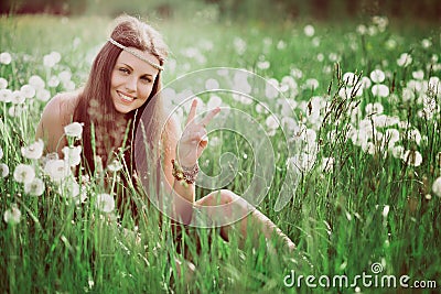 Peace sign from smiling free hippie Stock Photo