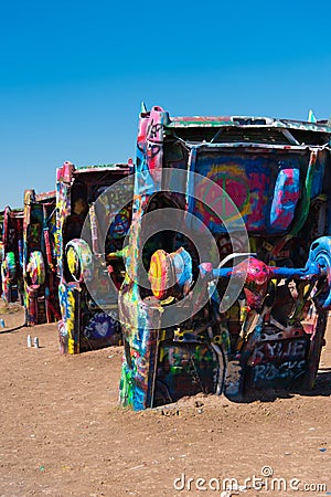 Peace sign on the underside of a car at Cadillac Ranch Editorial Stock Photo