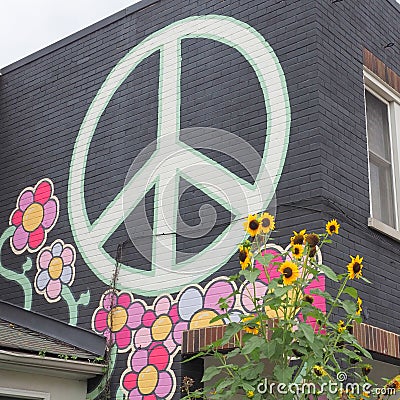 The peace sign was paited on the side of this building in Perkasie, PA. Editorial Stock Photo