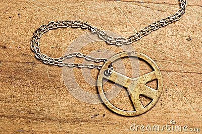 Peace symbol necklace. Stock Photo