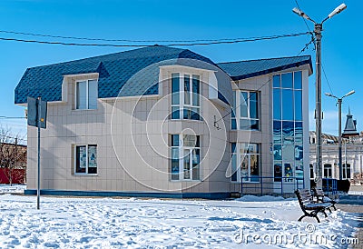Peace to the huts! Gazprom's subscriber sales department, Kamyshin, Russia, this winter. Stock Photo