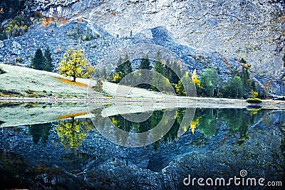 Peaceful autumn view on Obersee lake in Swiss Alps Stock Photo