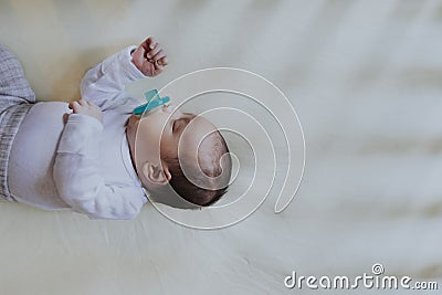 Peaceful baby sleeping in a crib Stock Photo