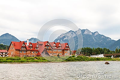 Peaceful european waterfront resort by mountains Stock Photo