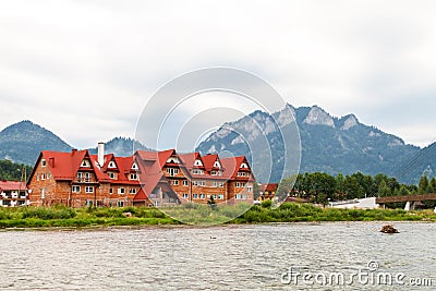 Peaceful european waterfront resort by mountains Stock Photo