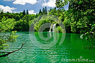 A peaceful lake and waterfal Stock Photo
