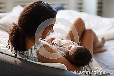 Mother feeding baby with breast Stock Photo