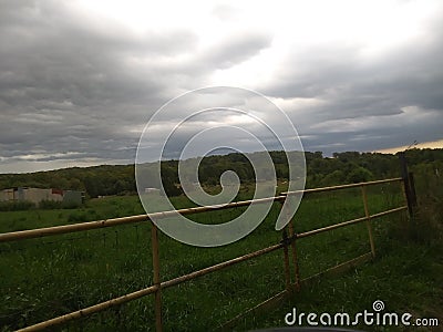 Peaceful Missouri Farm land with a brewing storm Stock Photo