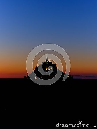 Night blue hour sunset over Mont Saint Michel, Normandy, France Stock Photo