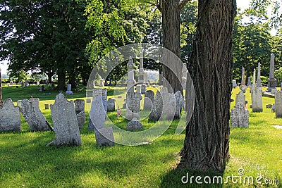 Peaceful scene with old weathered headstones in Revolutionary War Cemetery, Salem, New York, 2016 Editorial Stock Photo