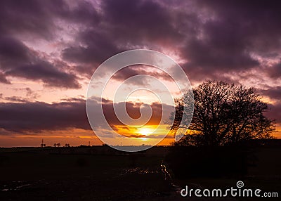 Peaceful sunset in countryside Stock Photo