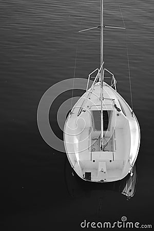 Peaceful view of sail boat in black and white Stock Photo