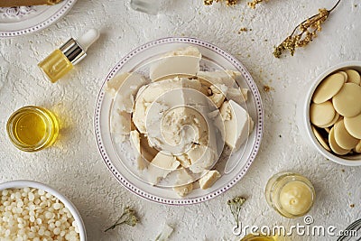 Peaces of shea butter or karite with other ingredients for natural cosmetics Stock Photo