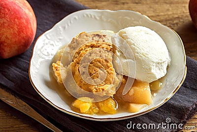 Peach cobbler with ice cream Stock Photo