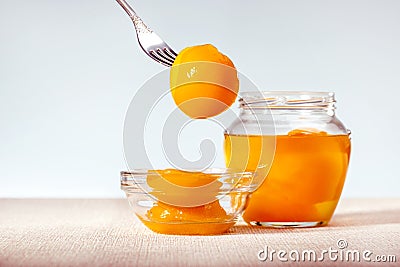 Peach compote with half peaches Stock Photo