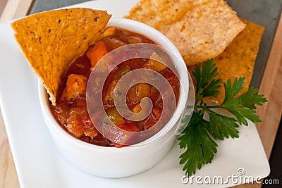 Peach Mango Salsa and chipotle Chips Stock Photo