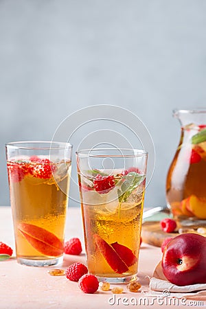 Peach raspberry iced tea, summer refreshing drink, beverage, cocktail Stock Photo