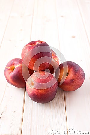 Peaches on wood table Stock Photo