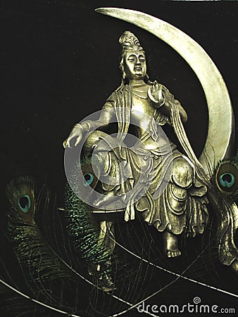 peacock feathers, crescent moon, meditating buddha PEACE Stock Photo