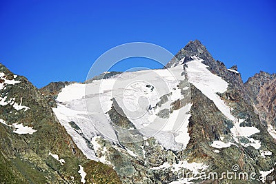 The peak of Grossglockner mountain seen from the southwest. Stock Photo