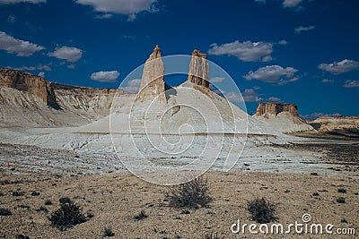 Peaked rocks and chines in Bosjira mountain canyon, plateau Ustyurt, Kazakhstan desert Stock Photo