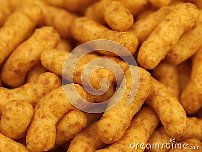 Peanut flips close up, corn puffs snack background Stock Photo