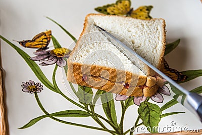 Peanutbutter bread and knife Stock Photo