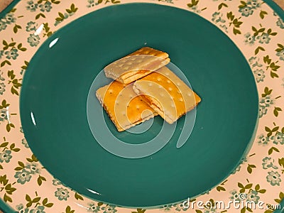 Peanutbutter filled crackers on a plate Stock Photo