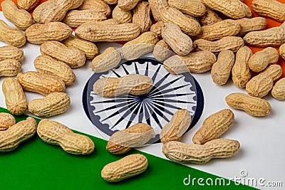 Peanuts in shell on flag of India. Stock Photo