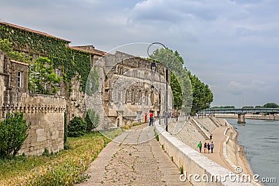 Peaple walking along the banks of the Rhone Editorial Stock Photo
