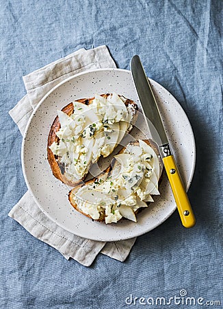 Pear, blue cheese, thyme sandwiches - delicious breakfast, snack, brunch on a blue background Stock Photo