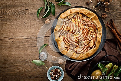 Pear galette with walnuts, cinnamon and lemon zest Stock Photo