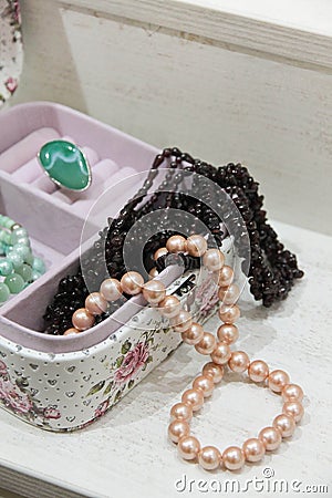 Pearl and garnet necklace in a pink box Stock Photo