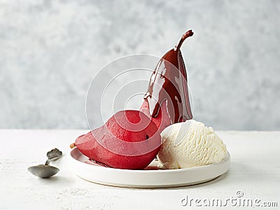 Pears poached in red wine Stock Photo