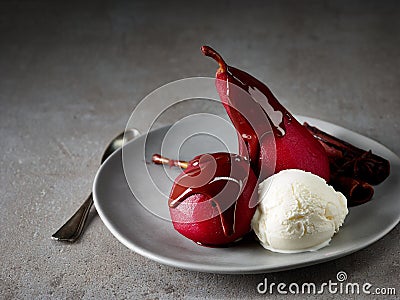 Pears poached in red wine Stock Photo