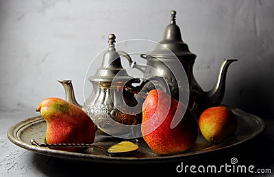 Pears on a silver dressing Stock Photo