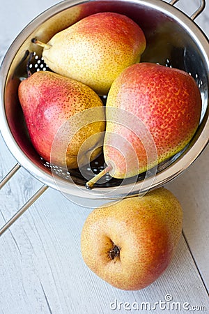 Pears on the wooden table. Fresh fruit. Stock Photo