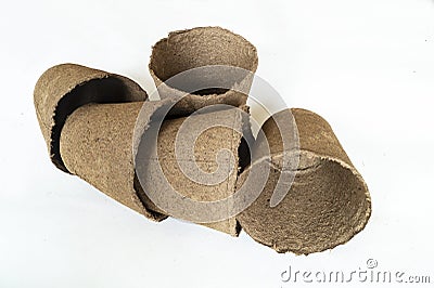 Peat containers for seedings on white background Stock Photo