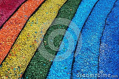 Pebble stones laid out in the form of a rainbow. Stock Photo