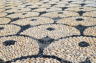 Pebbles mosaic on the floor on Rhodes island Stock Photo