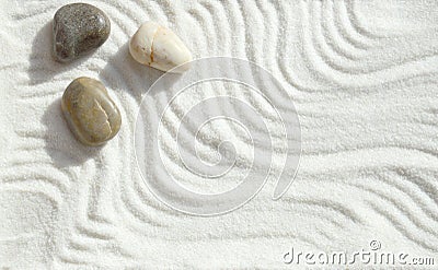 Pebbles in the sand, a background of appeasement Stock Photo