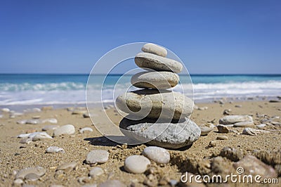 Pebbles stacked up on a cove Stock Photo