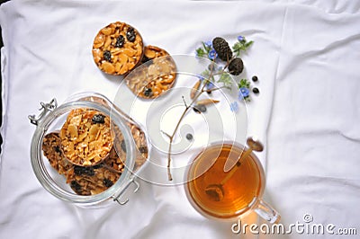 Still life with pecan biscuits and tea as a healthy breakfast Stock Photo