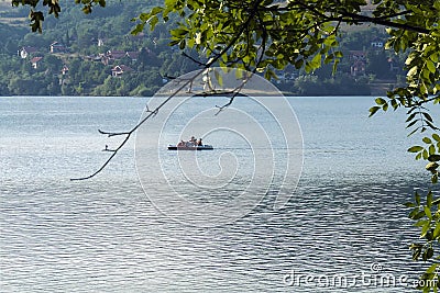 Pedalo - paddle boat sail on the lake at sunny day Stock Photo