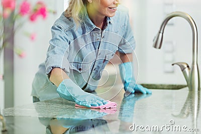 Pedantic woman and household cleaning Stock Photo