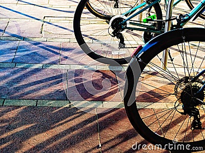 Peddle Bike Wheels Sun Reflections Stock Photo